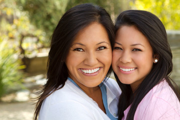 Asian mother and teenage daughter.