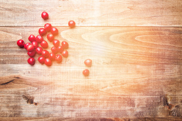 Fresh cherries on a wooden table