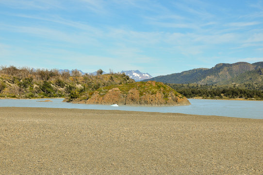 Sand beach close to the glacier at del Paine National Park