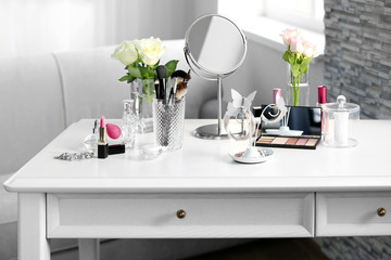 Cosmetic set on light dressing table