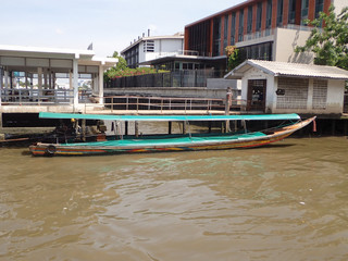 Fototapeta na wymiar Wooden boat is a transportation at Bangkok