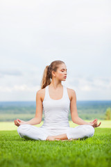 Young girl doing yoga outdoor