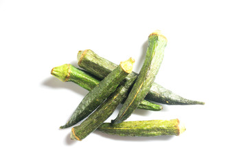 Healthy okra chips isolated on white background