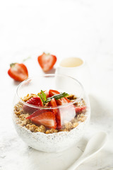 Homemade dessert with granola and berries