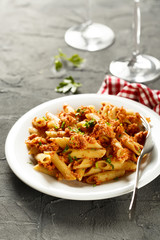 Pasta with chicken and tomato sauce
