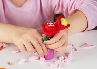 Child hands  with colorful clay - 116584882