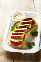 Sandwich with chicken and tomatoes
