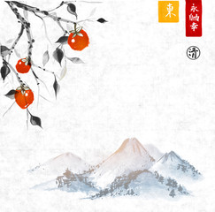 Date plum tree with perssimon fruits and landscape with mountains on rice paper background. oriental ink painting sumi-e, u-sin, go-hua. Contains hieroglyphs - eternity, freedom, happiness, clarity