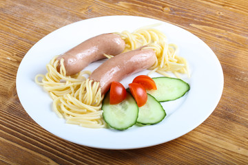 Kids spaghetti with sausages