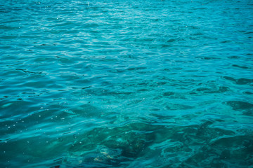 Fototapeta na wymiar Calm ripples of ocean water