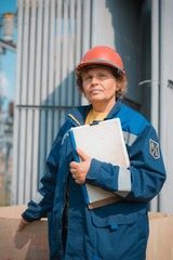 Electricians on high voltage substation