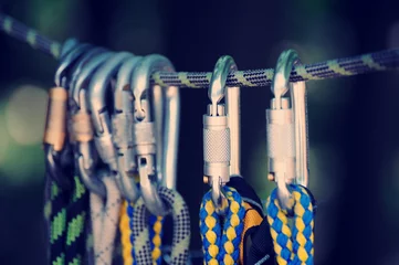 Foto op Aluminium Climbing sports image of a carabiner on a rope © Pavlo Burdyak