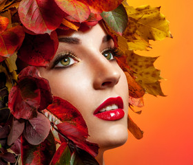 Autumn Woman Fashion Portrait. Beautiful Model Girl with colourf