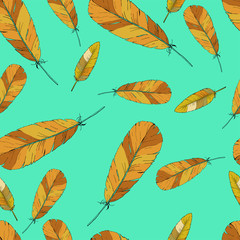 Seamless multicolor feather pattern drawn by ink. Yellow and beige feathers on blue background. Hand drawn vector illustration.