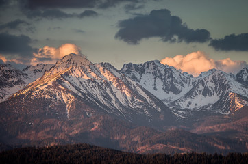 Cloudy Tatra mountains in the morning, covered with snow