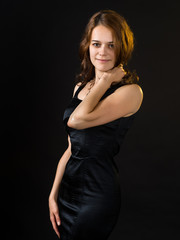 Fototapeta premium Beautiful girl in a tight-fitting dress