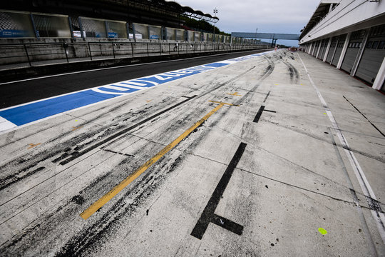 View From The Pole Position In A Racetrack.