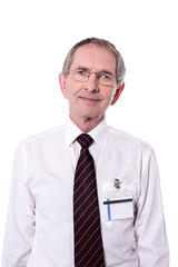 Bespectacled senior male doctor