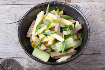 Asian salad with meat and pear