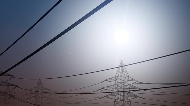 Power line against clear sky, high altitude dolly shot. 4K seamless loop able CG clip, simplified design