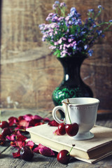 vintage composition cherry berry on wooden background