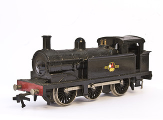 Fototapeta na wymiar Toy Electric Model Train on White Background