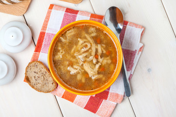 Traditional polish tripe soup with vegetables.