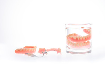 Dentures in glass of water