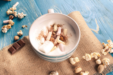 Coffee with marshmallows on the boards.