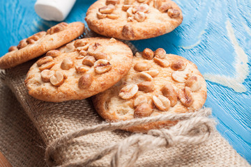 Cookies with peanuts on wooden boards. Homemade baking