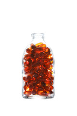 Bottle with gelatin capsules on white