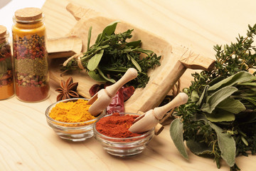 Wooden table of colorful spices