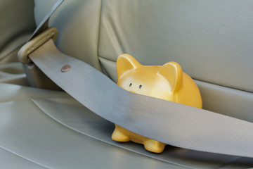safety belt gold piggy bank