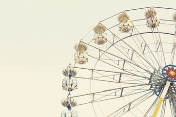 ferris wheel against blue sky retro effect image