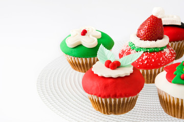 Christmas cupcakes isolated on white background

