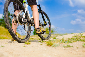 Fototapeta premium The athlete with the bike.