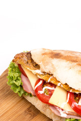 Closeup macro bread sandwich meat tomato cheese