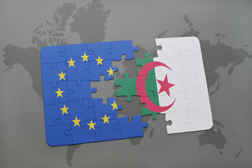 puzzle with the national flag of european union and algeria on a world map background.