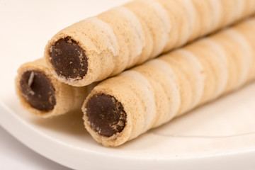 Closeup macro wafer chocolate cream rolls
