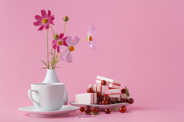 Coffee, sweets and flowers in Holiday