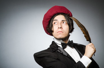 Fototapeta premium Funny writer with quill in vintage concept