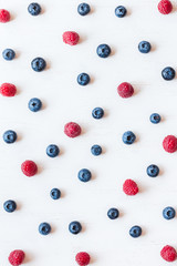 pattern of blueberry and raspberry, top view, flat lay