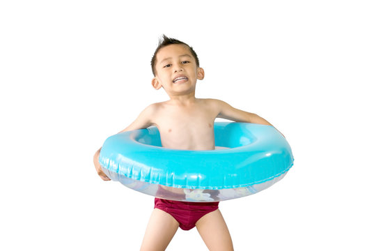 Cute Asian boy only in his underwear standing and holding a swim ring isolated on white background.