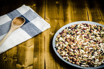 goji berry dried, with spoon, closeup background.
