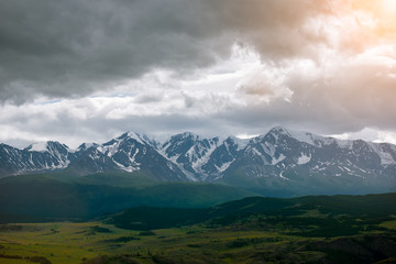 Obraz na płótnie Canvas beautiful landscape of mountains and steppe on sunset background
