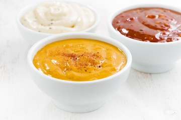 assortment various sauces in bowls