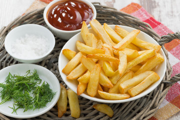 fried french fries with tomato sauce