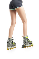 Close up  picture of woman's legs with rollerskates 