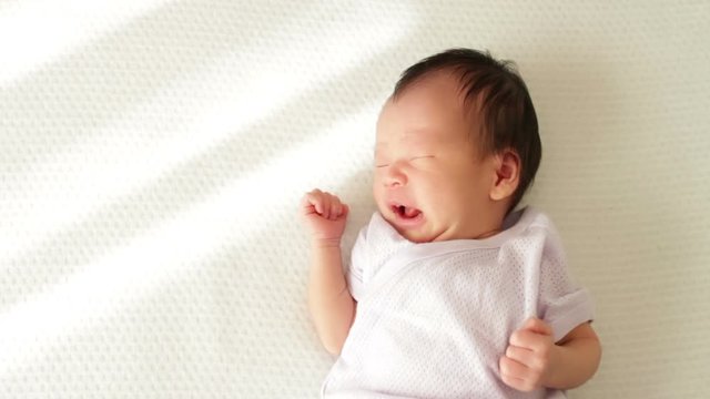 asian baby sleeping on bed, Japanese