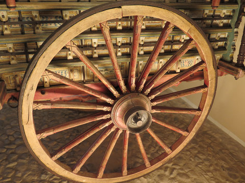Old wooden cart wheel
